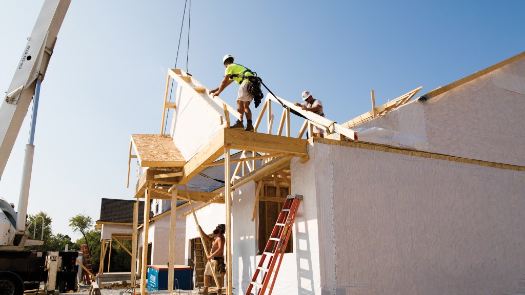 Informacja prasowa Homebuilding Solutions przygotowana przez MiTek - Widok drewnianej kratownicy montowanej w domu jednorodzinnym